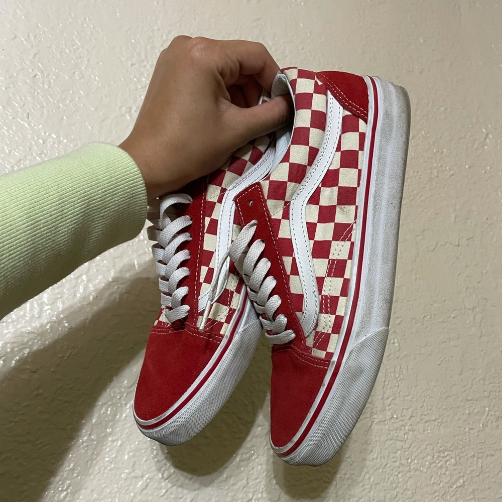 Red checkered Vans sneakers